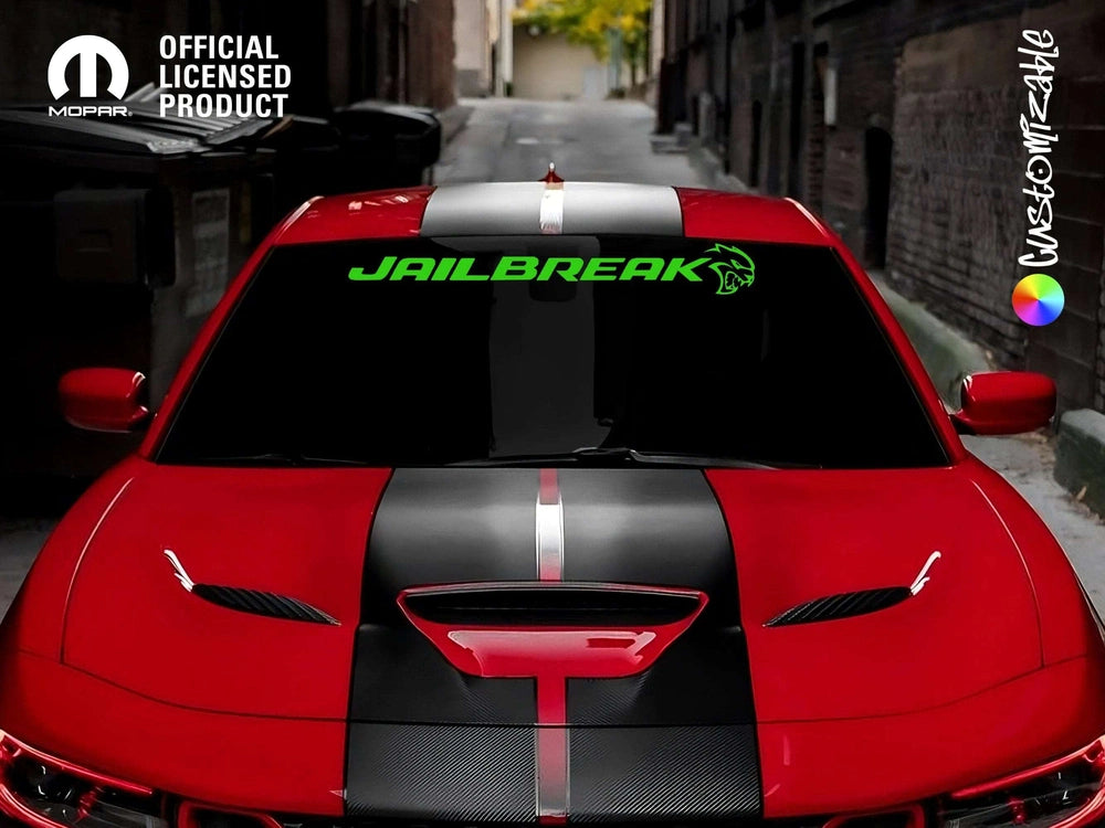 Red Dodge Challenger with black racing stripes and green Jailbreak logo decal on windshield, parked in urban alley. Official licensed product logo visible.