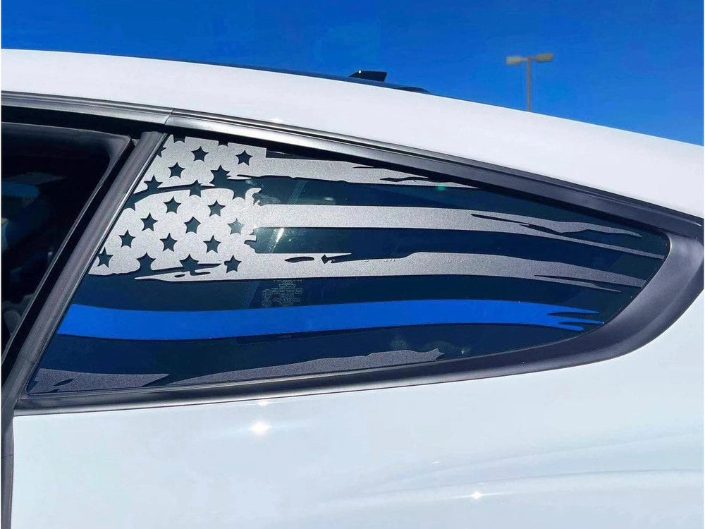 Ford Mustang quarter window with custom Police Support flag decal featuring distressed American flag design with thin blue line, showcasing patriotic and law enforcement support on white car exterior