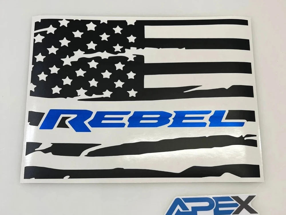 Custom rear sliding window decal for RAM trucks featuring distressed American flag design with REBEL logo in blue, designed for 2009+ models, offering unique patriotic styling