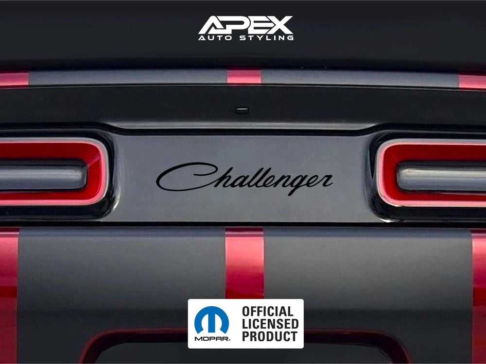 Close-up view of Dodge Challenger taillight divider with custom decal featuring Challenger text logo, showcasing red and black color scheme and APEX Auto Styling branding, highlighting the product's customizable design and official licensed status.